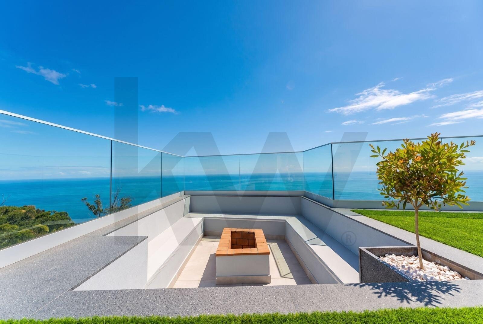 Villa Ponta do Sol — lounge exterior com lareira